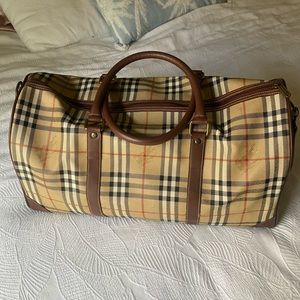 Burberry Vintage travel luggage with strap